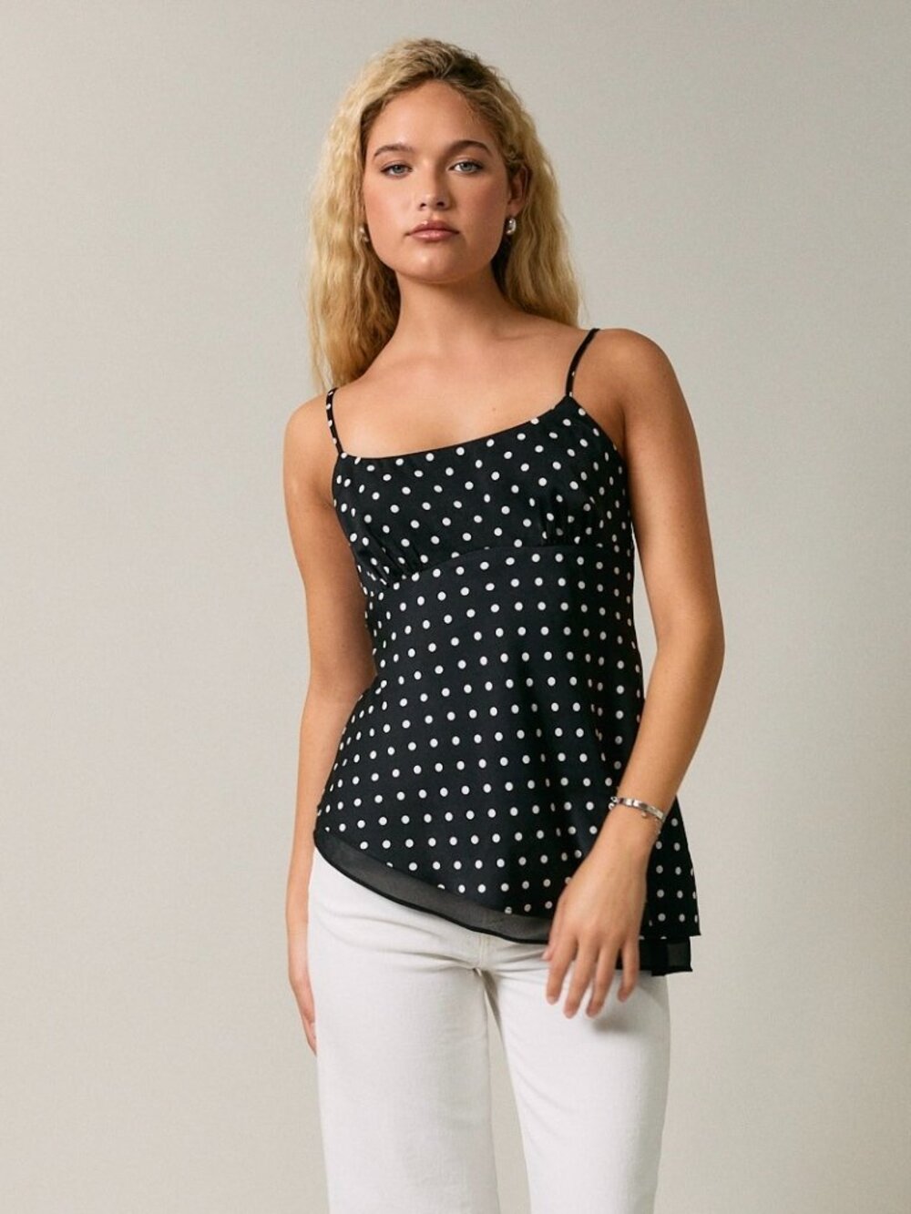COMING SOON TO THE LEFT BLACK POLKA DOT ASYMMETRICAL TANK TOP